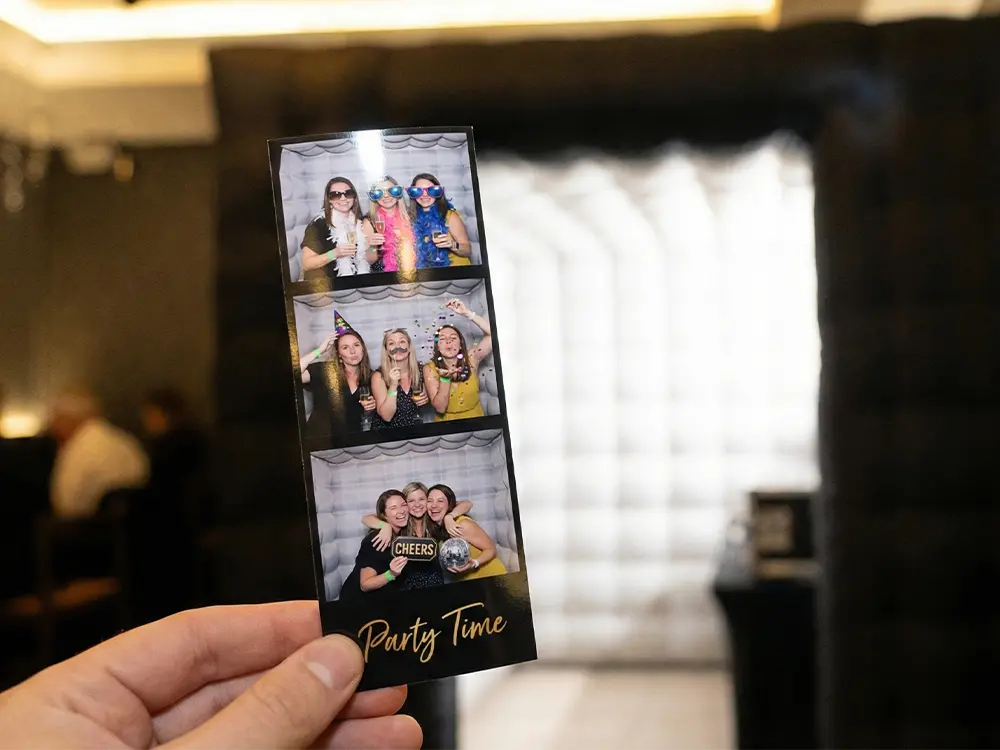 Guests enjoying the inflatable bubble photo booth